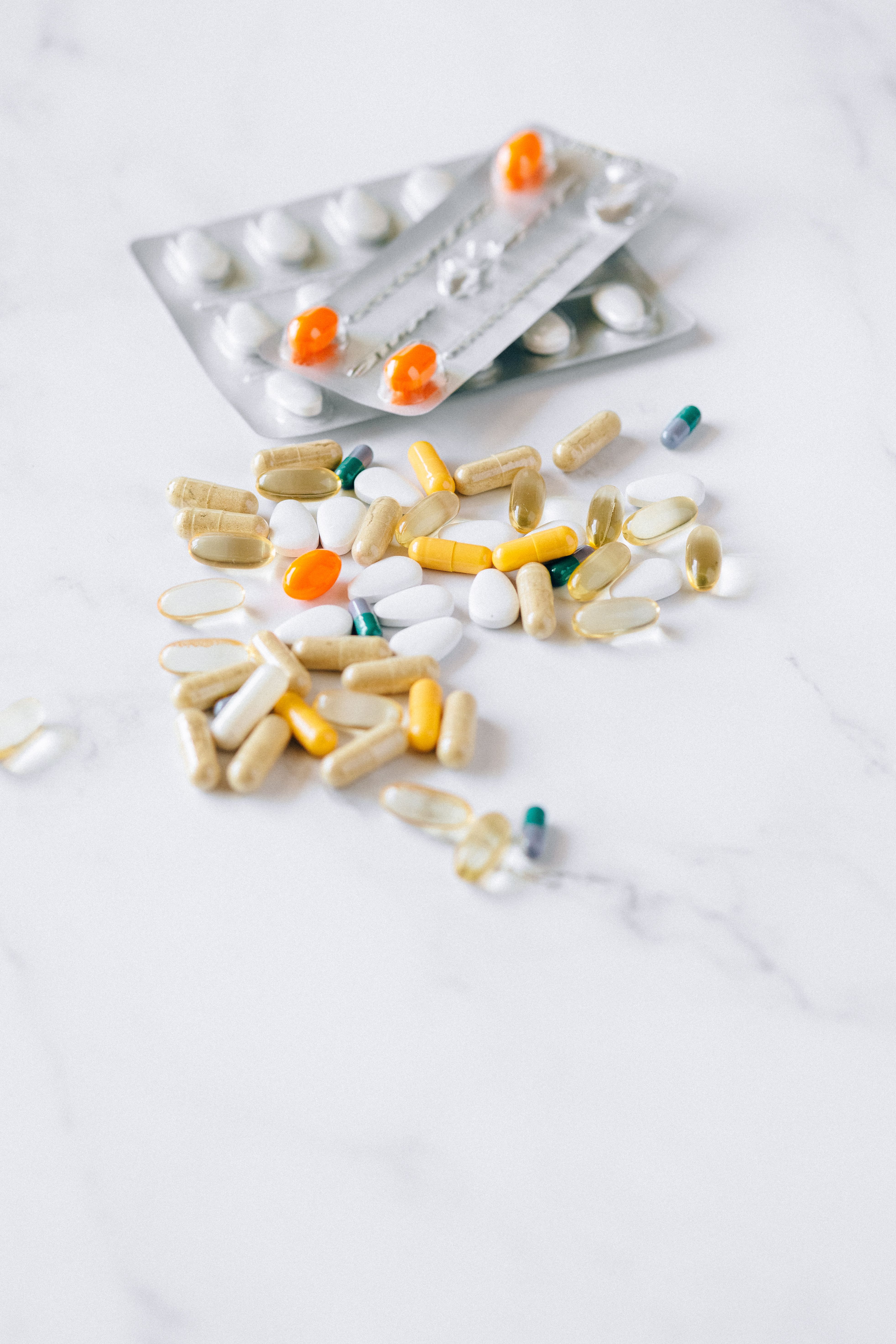 Assorted compounded medications on a clean surface